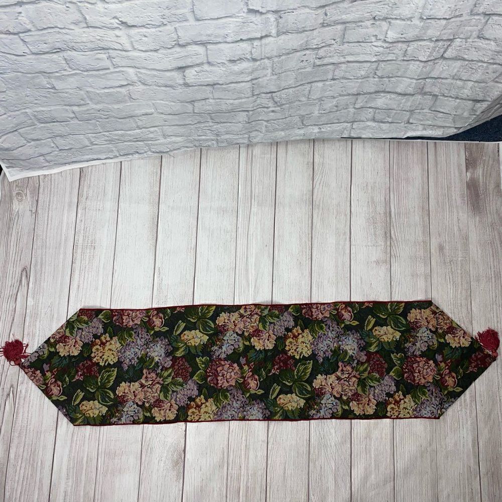 Floral print table runner with fringe ends approx 
52”x12.5”